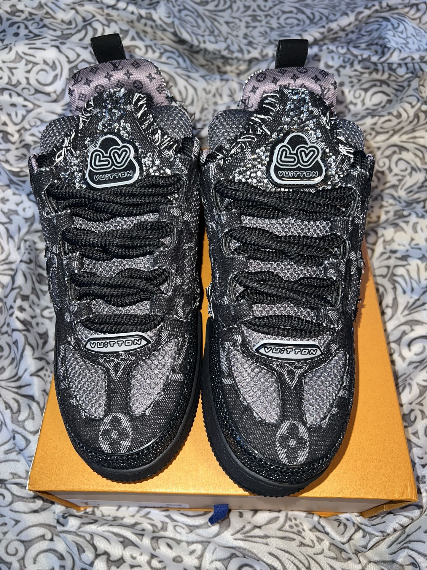 Black and grey Louis Vuitton Swavorski Skates