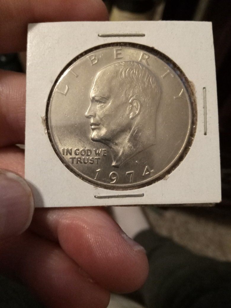 EISENHOWER DOLLAR. ( 1974 D ). IN GOOD CONDITION