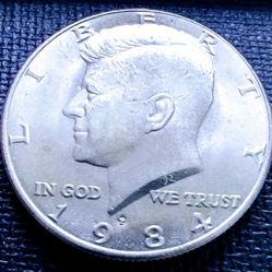 1984-P Kennedy Half Dollar In Very Good Circulated Condition.