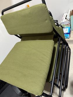 FOUR Green cushioned lounge chairs