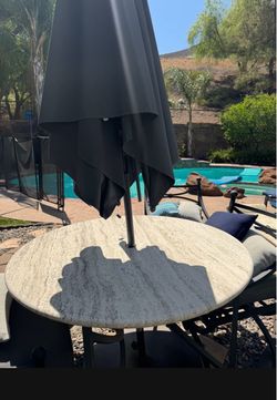 Outdoor 48” Travertine stone table