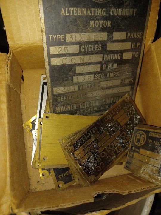 Box full of brass name plates