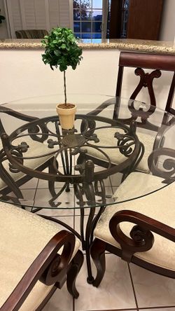 Beautiful Italian glass dining table Beautiful Italian glass rought Iron . With four chairs