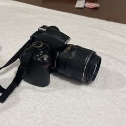Nikon D3000 With A Nixon Do Af-s Nikkor 18-55mm 1:3.5-5.6G