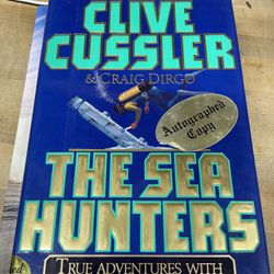 Clive Cussler “ The Sea Hunters” Autograph Signed book 