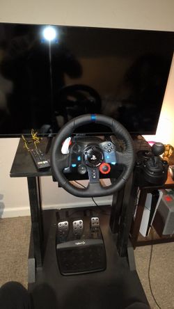 Logitech g29 wheel, shifter, and pedals stand included