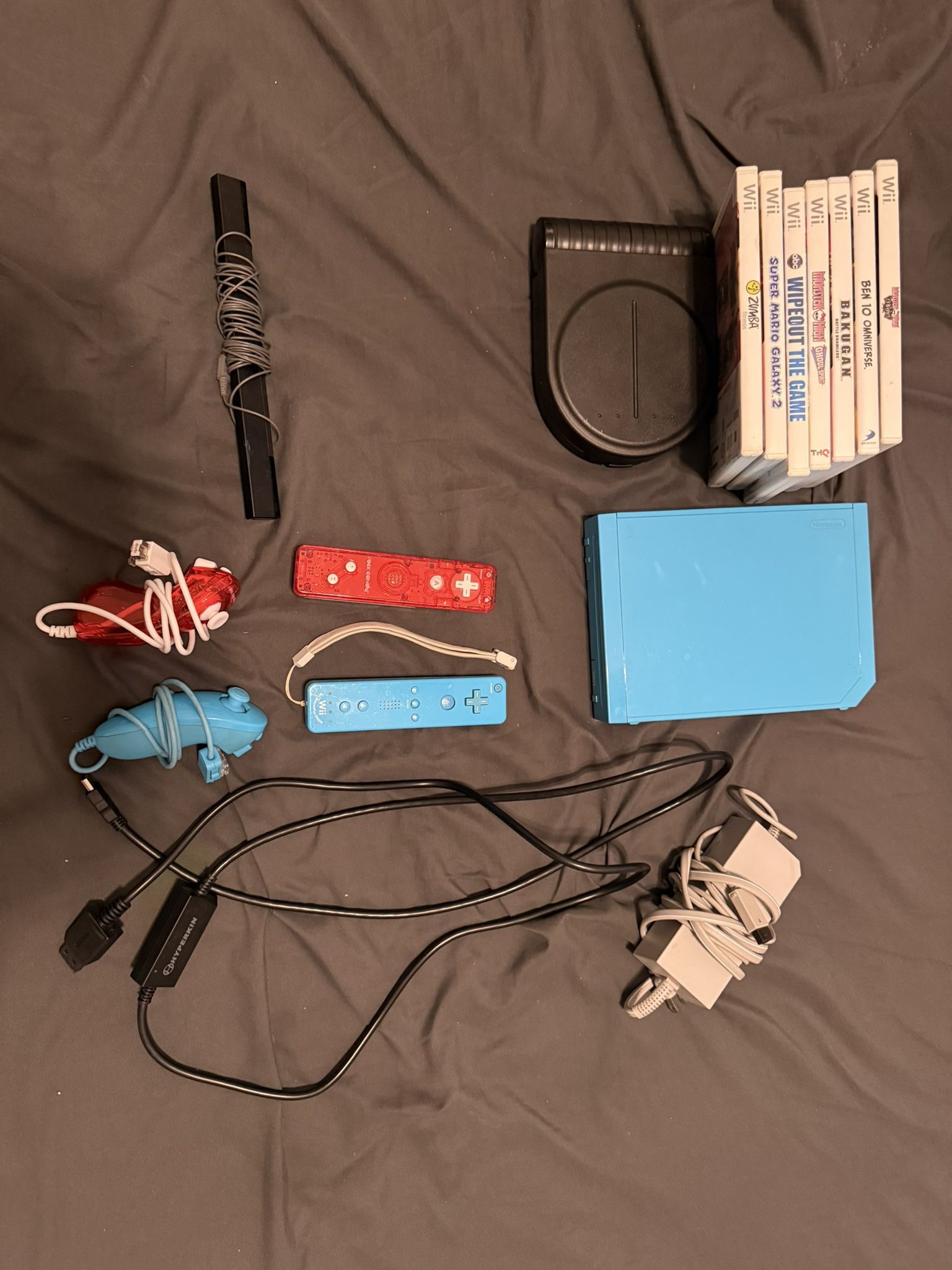 Wii Console with Games, Controllers, HDMI Adapter, and Game case
