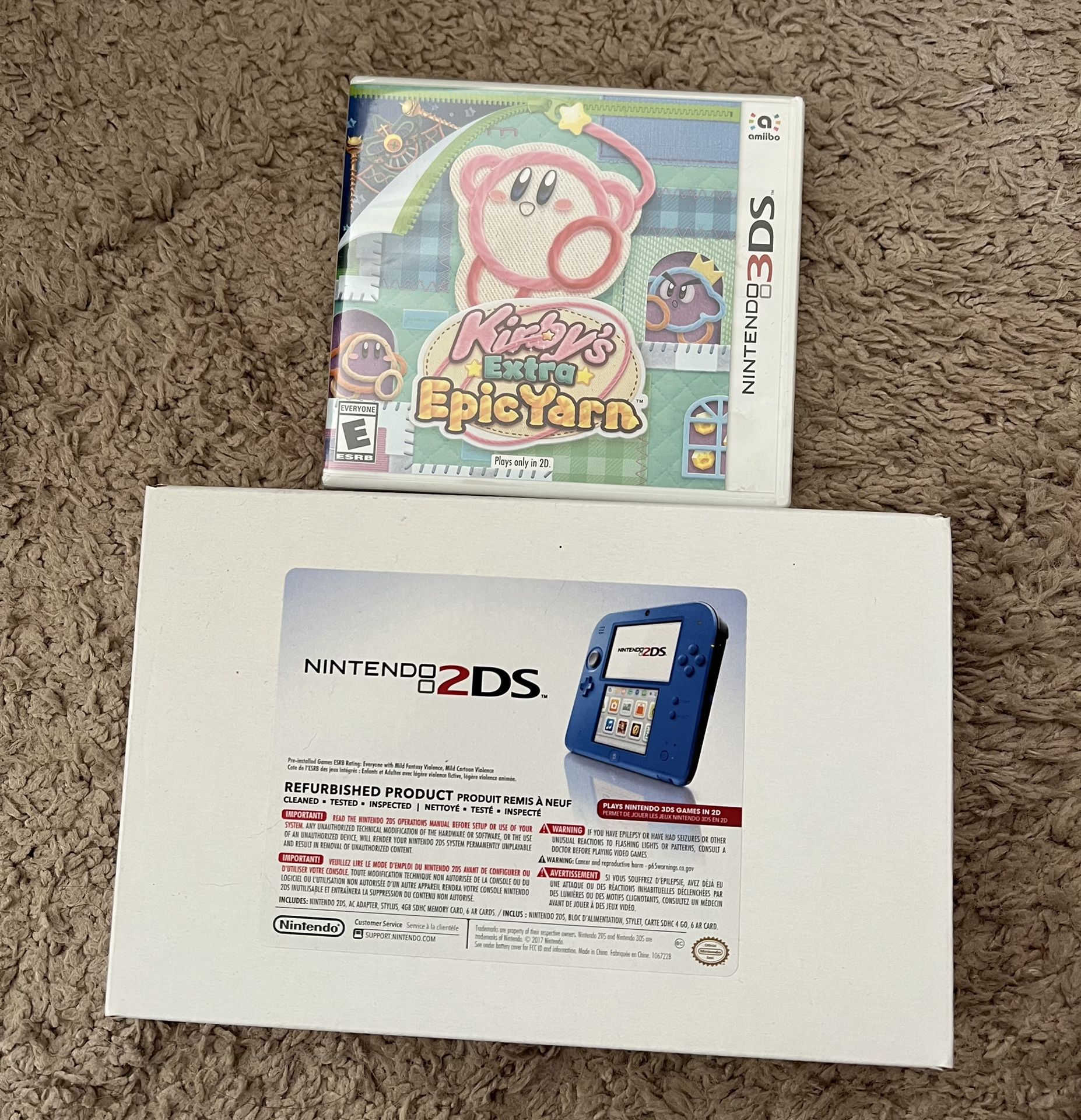 nintendo 2ds with a New Sealed Copy kirby epic yarn 3ds