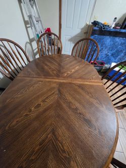 Wooden table with 6 chairs