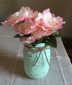 Distressed mason jar vase with silk flowers $5