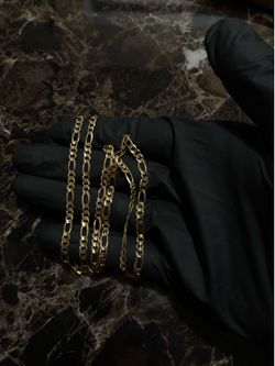 14k figaro style chain 22 inches