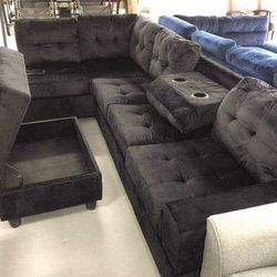 Black Water Resistant Fabric Reversible Sectional With Cup Holder And Storage Ottoman. Brand New.