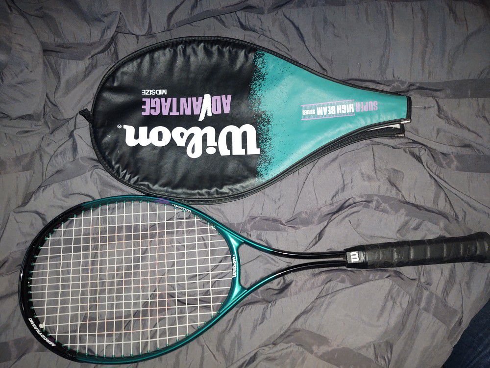 Wilson Advantage Midsize Tennis Racket and matching carrying case. 

