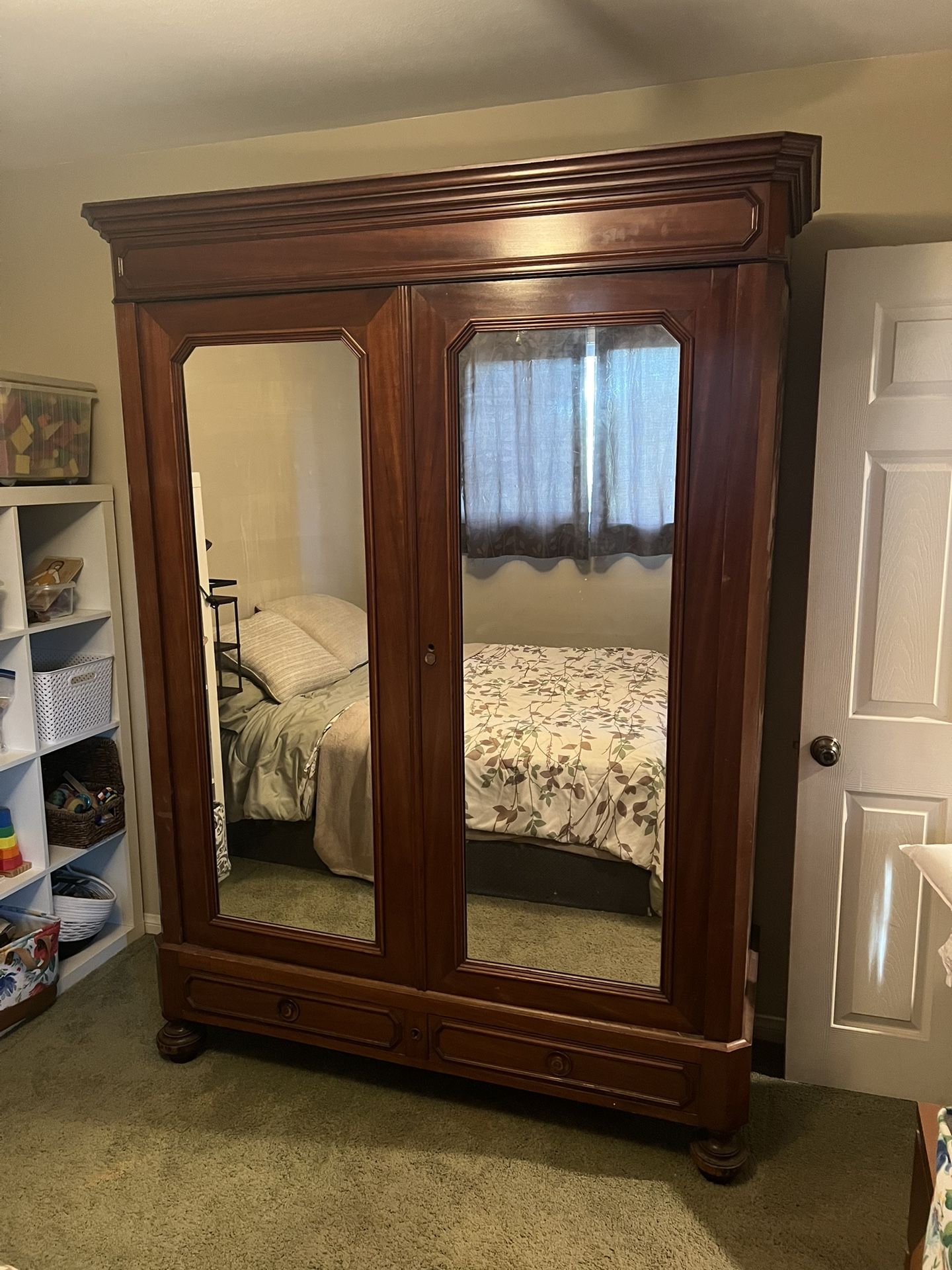 Antique mirrored armoire, 19th century.