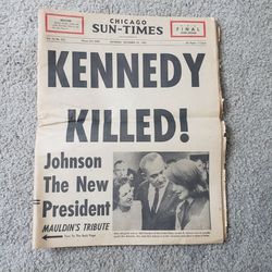 Newspaper exclaiming the death of JFK