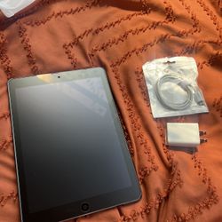 iPad With New Screen Protector, Case, And Charger 