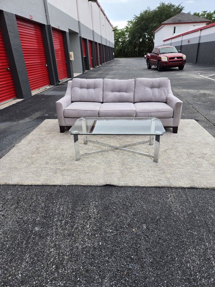 Sofa.. With Rug And Coffee Table