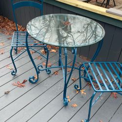 Two Garten Chair And Glass Table.  