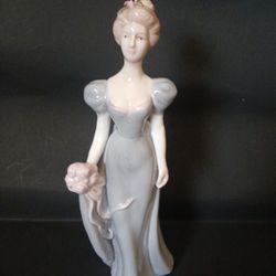 Glazed Porcelain Lady with Bouquet (10" tall)