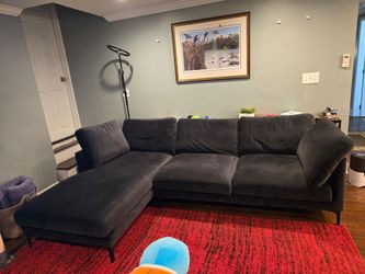 Black couch, very comfortable, excellent condition.