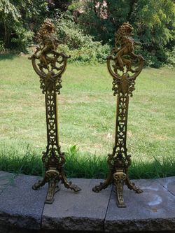 Rococo brass lion andiron fireplace stands