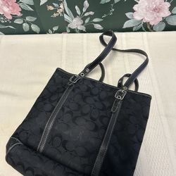 black Coach Signature canvas and leather tote bag