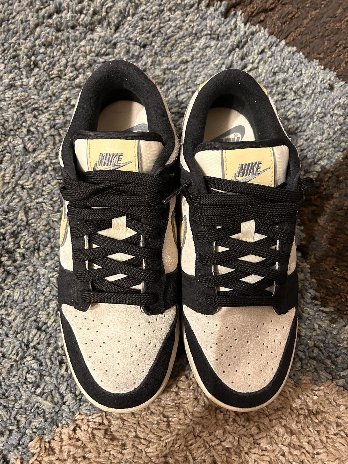 Nike Dunk Low “Black/Peanut Butter / Black/Sesame”–style colorway.