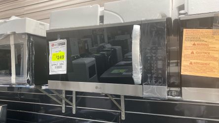 LG Microwave over the range  new $249 -1 year warranty