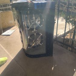 Two 12-inch subwoofers with their enclosure and two amplifiers. 