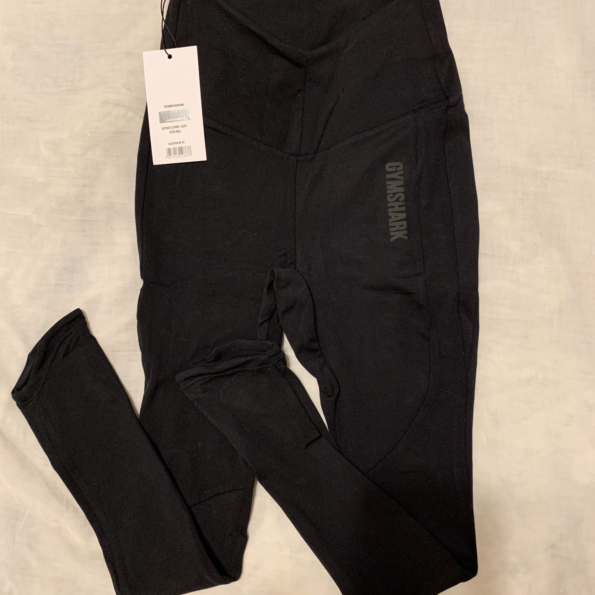Gymshark athletic pants with original tags attached