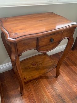 Side table with floral design