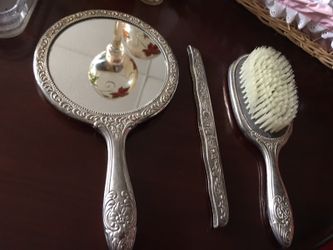 Antique mirror and brush