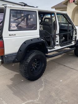1988 Jeep Cherokee Modified Off Road Vehicle/ Roll Cage/ Tube Doors/ Winch Bumper/ And Lockers In Axles/ Selling At $4,000 OBO