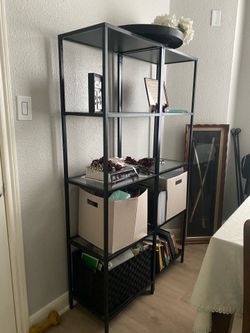 IKEA black metal bookshelves