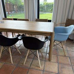 2 Black And 1 Light Blue Chairs