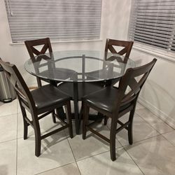 Glass 54" Round Table With 4 Chairs.