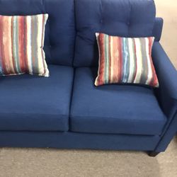 Tufted Blue Couch With Pillows