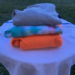 Three sweatshirts