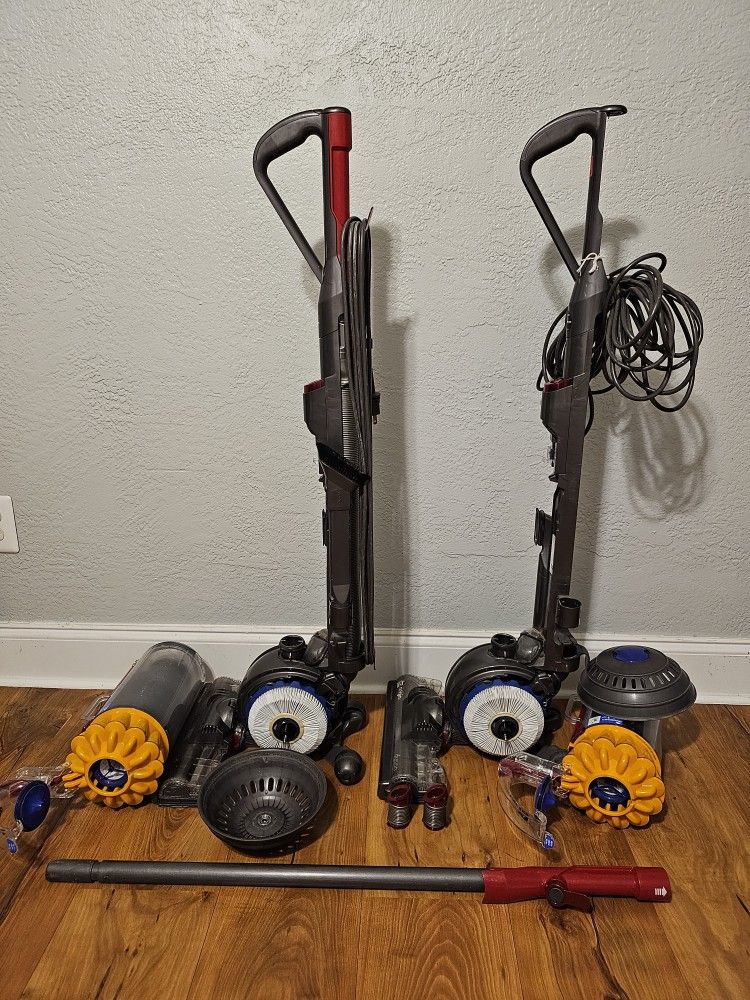 TWO Dyson DC40 working Vacuums