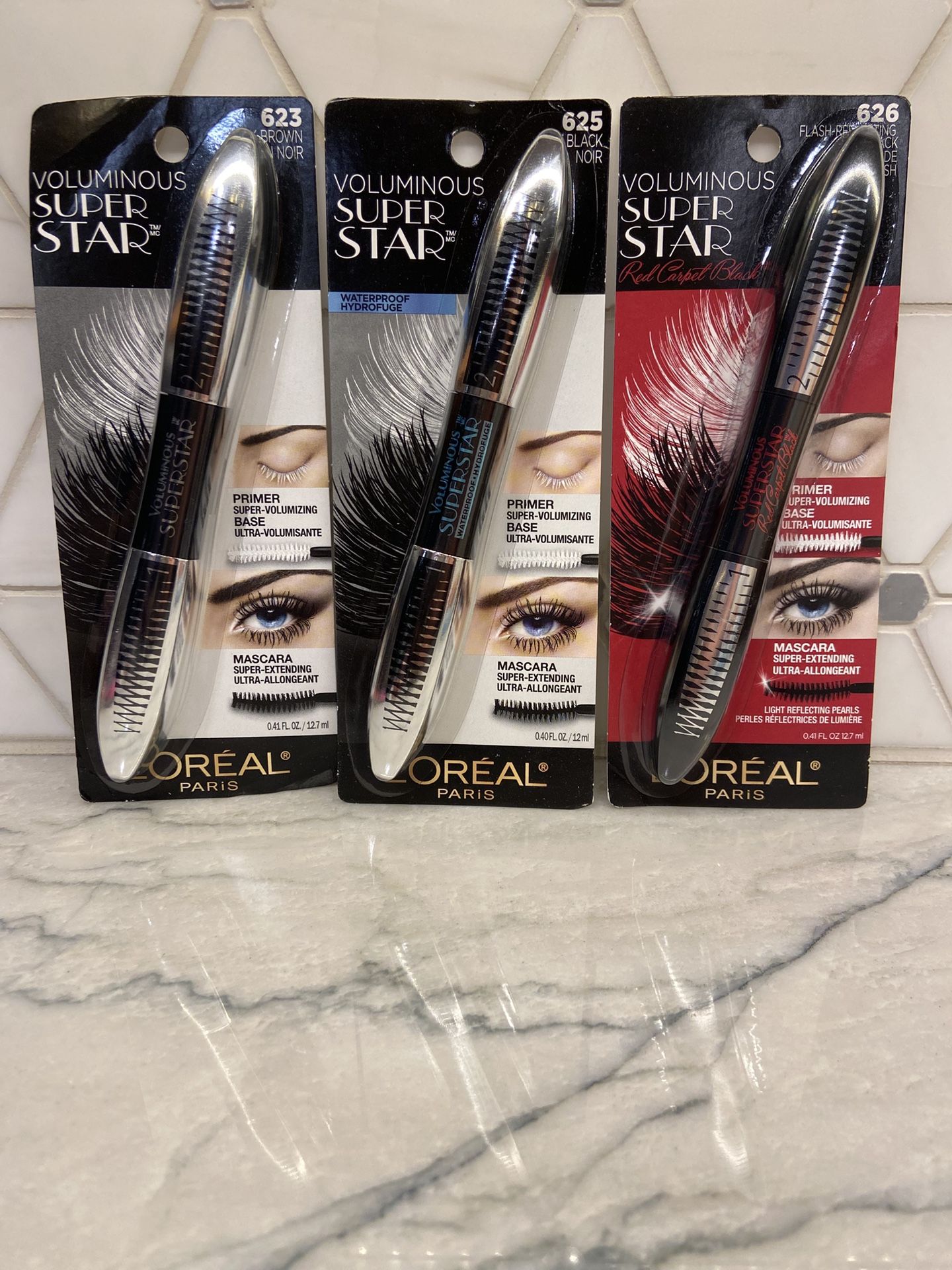 L'Oreal Paris Voluminous Superstar Waterproof Mascara, Black; or non-waterproof Flash-reflecting Black, or Black Brown. New