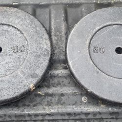 50 Lb Standard  Barbell Plates Total Of 100 Lbs 