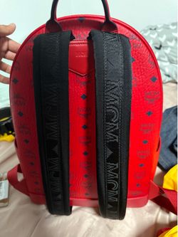Candy Red MCM backpack and Black reversible MCM belt