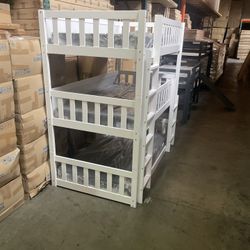 Triple bunk bed. Available in white & espresso. Assembly required. Assembly not included. Taxes included. Free delivery.  Bunk bed only-$450 Bunk bed 