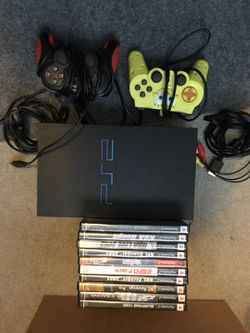PS2 with games and controllers