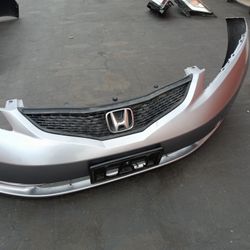 2009-2011 Honda Fit Complete Front Bumper With Grill And Emblem And Accessories Oem. 