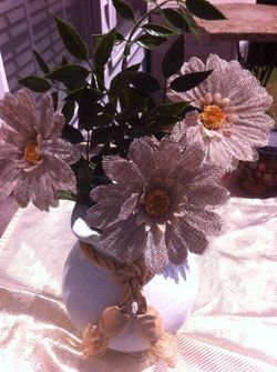 Ceramic vase with burlap flowers