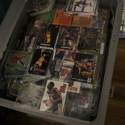 A Box Full Of Sports Cards From 1980 To 1990 