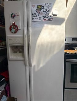 White Side-by-Side Refrigerator with Ice and Water Dispenser