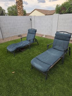 Lounge chairs and outdoor umbrella