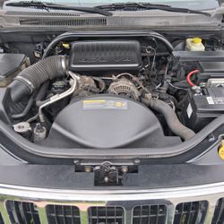 Two thousand and six grand cherokee v eight excellent condition , a hundred and thirty six thousand miles only